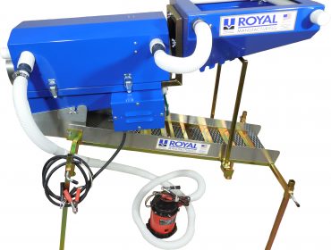 A blue Trommel Kit by Royal with a hose attached to it.