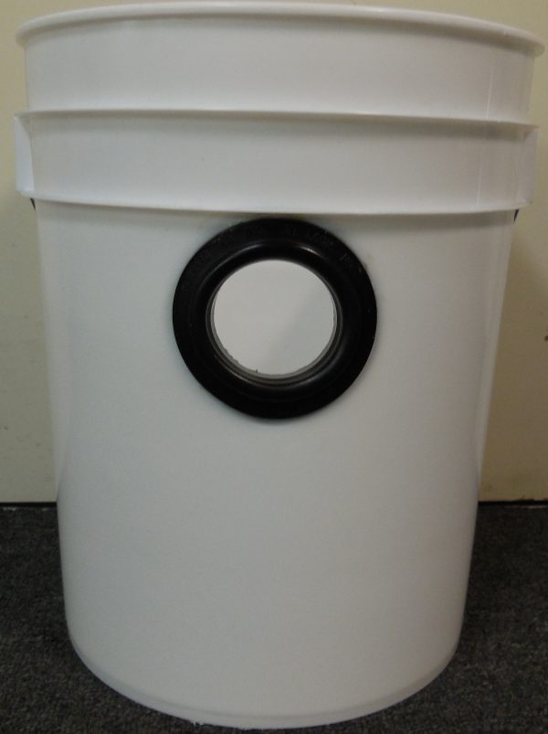 A white Rubber Grommet with a black hole on it (Bucket Sold Separate).
