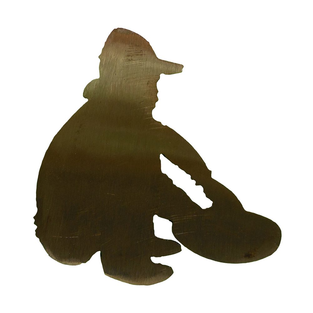 A silhouette of a Branding Iron Prospector sitting on the ground.
